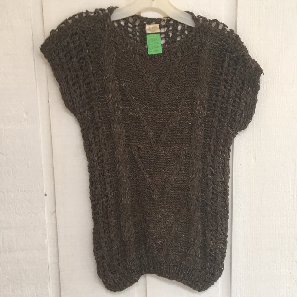 Suede, hand-knitted. Beautiful!